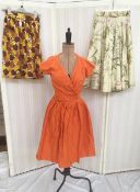 1950's/'60's full skirts, various patterns, a plain orange skirt with matching top with tie waist,