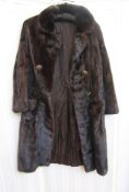 Full length black mink coat, c.1980's, half belt, gilt and faux amber buttons detail, double