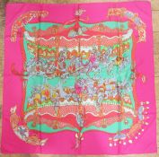 Hermes silk scarf within its original tissue paper and box - 'Tournez Manege', rolled edges,