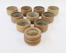 Set of nine Bath Pottery stoneware soup bowls and dishes with celadon glaze interior, impressed