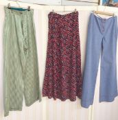 Various vintage skirts and trousers to include gold and green striped wide legged trousers with