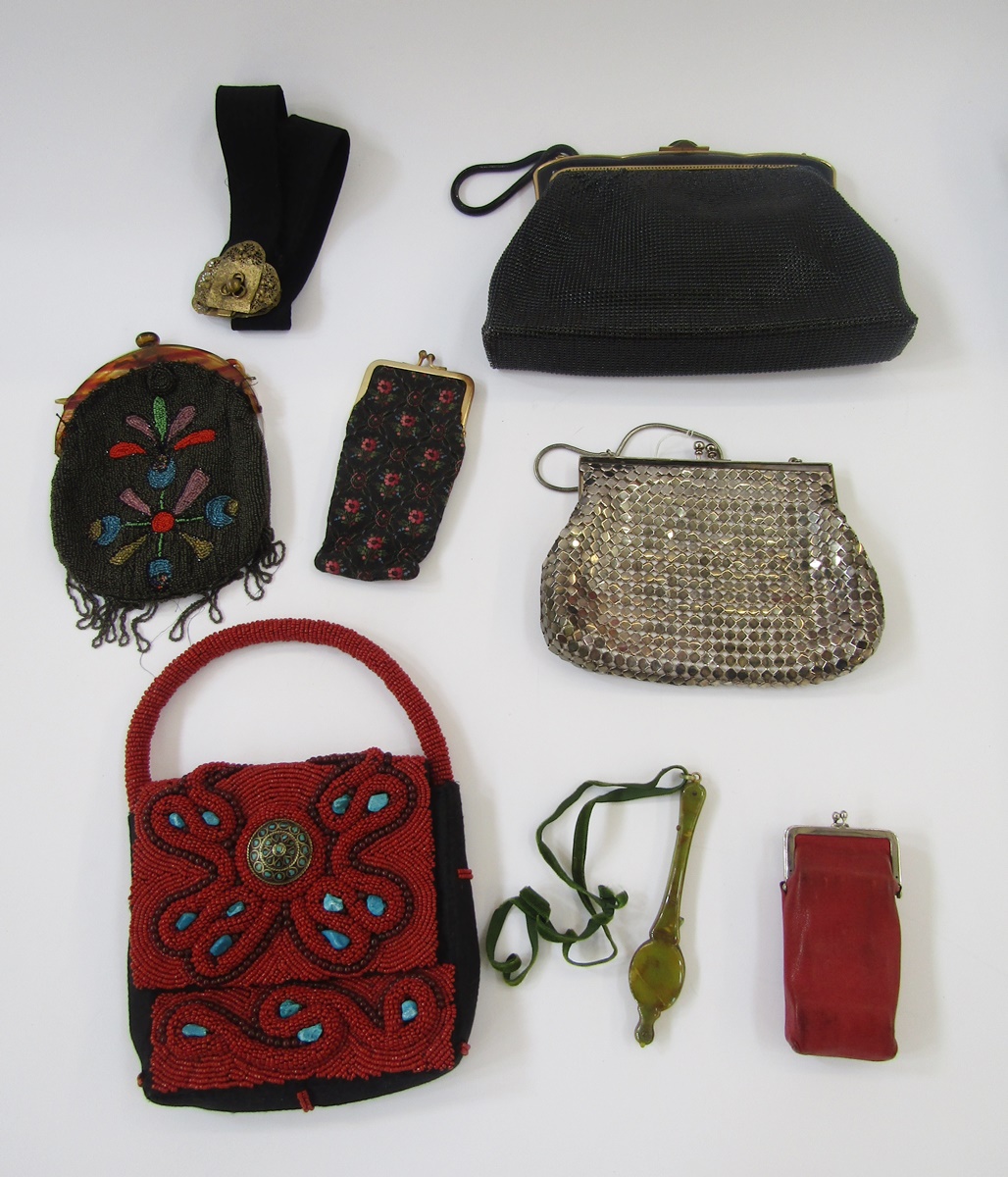 A black vintage evening bag labelled 'Oroton', black enamel and gilt metal fixed frame with single