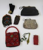 A black vintage evening bag labelled 'Oroton', black enamel and gilt metal fixed frame with single