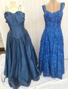 Various 1950's and 1940's evening dresses to include a blue, figured satin dress, with stiff