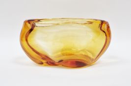 Whitefriars amber glass jardiniere/vase, of oval form with lobed base, designed by James Hogan,