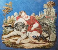 A Victorian tapestry/needlepoint work, depicting a child asleep with a St. Bernard dog, holding
