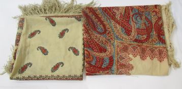 Two antique printed paisley shawls, both fringed