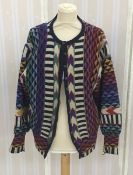 A Maggie White of Burford multi-coloured knitted wool blouson style jacket, balloon sleeves, the
