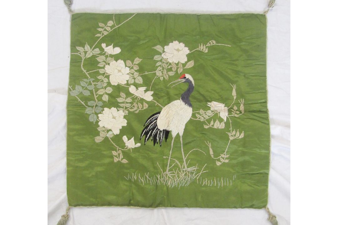 An Edwardian silk padded cover, embroidered with a crane amongst cherry blossom on a green silk - Image 8 of 12