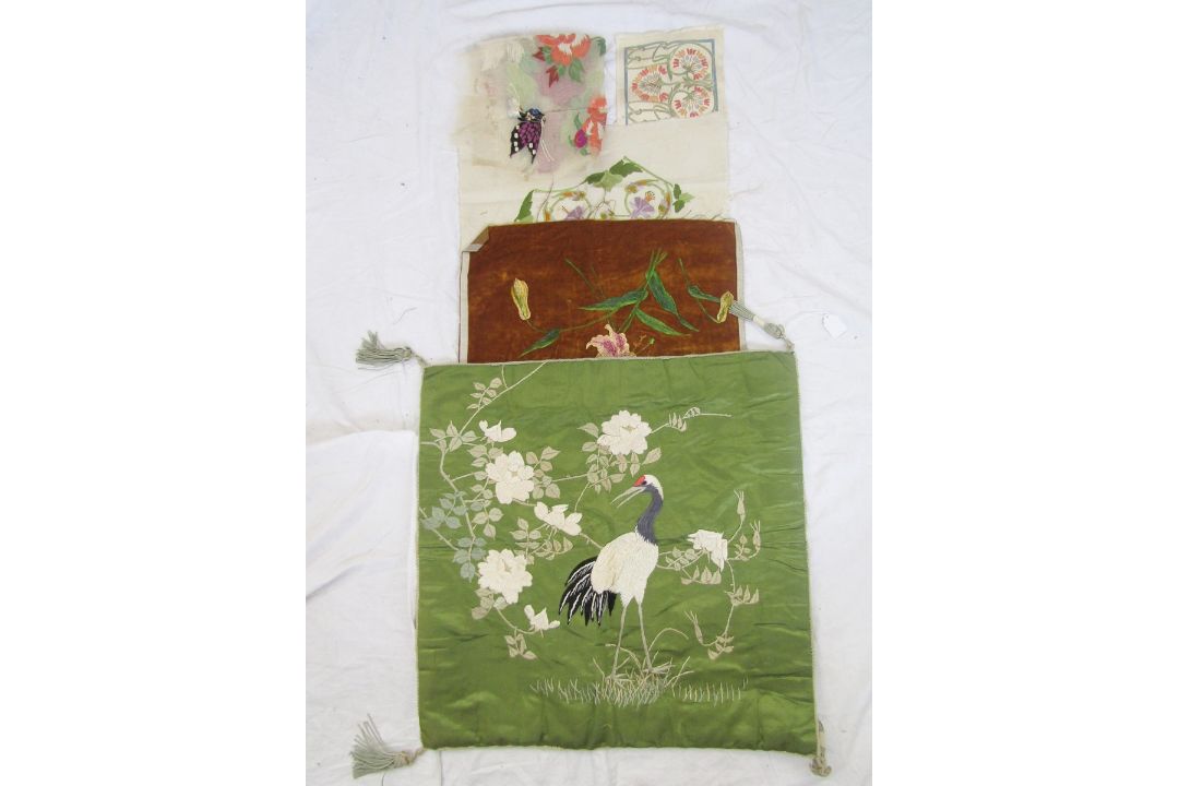 An Edwardian silk padded cover, embroidered with a crane amongst cherry blossom on a green silk - Image 1 of 12