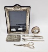 Silver mounted photograph frame, Birmingham 2000, rectangular with embossed flower decoration, easel