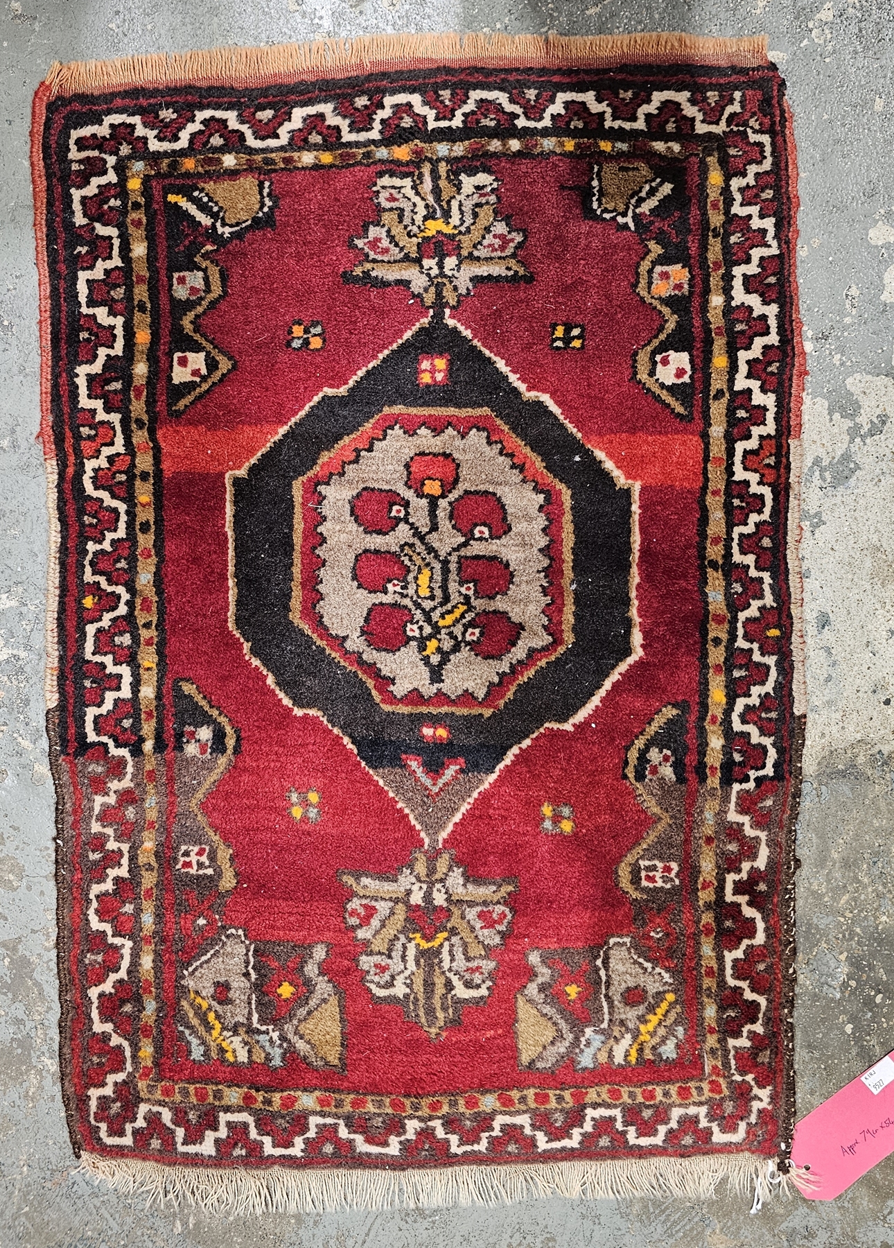 Eastern red ground rug with three central lozenge medallions flanked by two rows of four elephant - Image 2 of 2