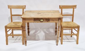 19th century small pine kitchen table, of rectangular form with drawer to side, raised on turned
