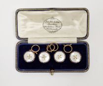 Set of four 18ct yellow gold dress studs, each with mother of pearl decoration and blue enamel rims,