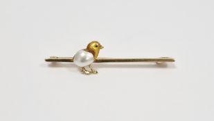 14k yellow gold bar brooch set with a yellow enamelled chick with its wing formed from a seed pearl,