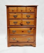 American Broyhill Furniture stained pine chest of five long drawers, the top drawer with three brass