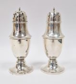 Pair of silver sugar casters, Birmingham 1931, Aaron Lufkin Dennison, of plain baluster form with
