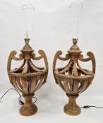 Pair of mid 20th century hardwood table lamps in the form of pierced carved urns, 69cm high x 38cm
