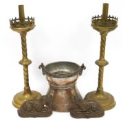 Pair of brass gothic revival altar candlesticks, with fleur-de-lys pierced sconces and twisted