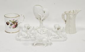 Royal Worcester white nautilus shell and coral vase, a leaf-moulded jug, two white glazed models