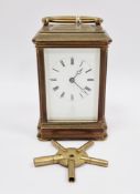 Late 19th century French gilt brass cased chiming carriage clock, with bevelled edge glass panels,