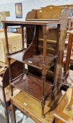 Mahogany open library side table in the Regency manner, with two shelves, one with a central