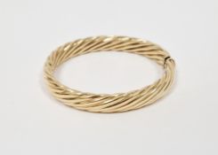 9K gold flattened twisted bangle, 24.1g