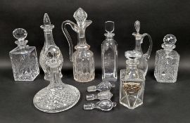 Collection of cut-glass decanters, stoppers and claret-jugs, including: a Baccarat 'Martell'-type