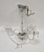 Glass three-branch electrolier with chrome fittings, strings of faceted glass beads and crystal