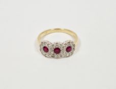18ct gold, pink and white stone triple cluster ring set three pink stones, possibly rubies,