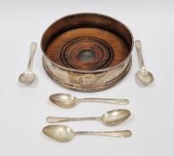 Silver and wooden wine coaster, London 1995, John Bull Ltd, of plain form with beaded edge, 12.5cm