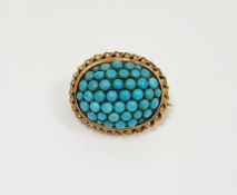 Victorian turquoise domed top cluster combination brooch/pendant, the yellow metal mount of oval