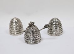 Novelty silver condiment set in the form of beehives, London 1990, Garrard & Co Ltd, comprising