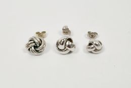 Two 9ct white gold knot-pattern earrings and another white metal knot-pattern earring, 2.6g total