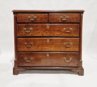 George III oak chest of two short over three long graduating drawers, the top with moulded edge