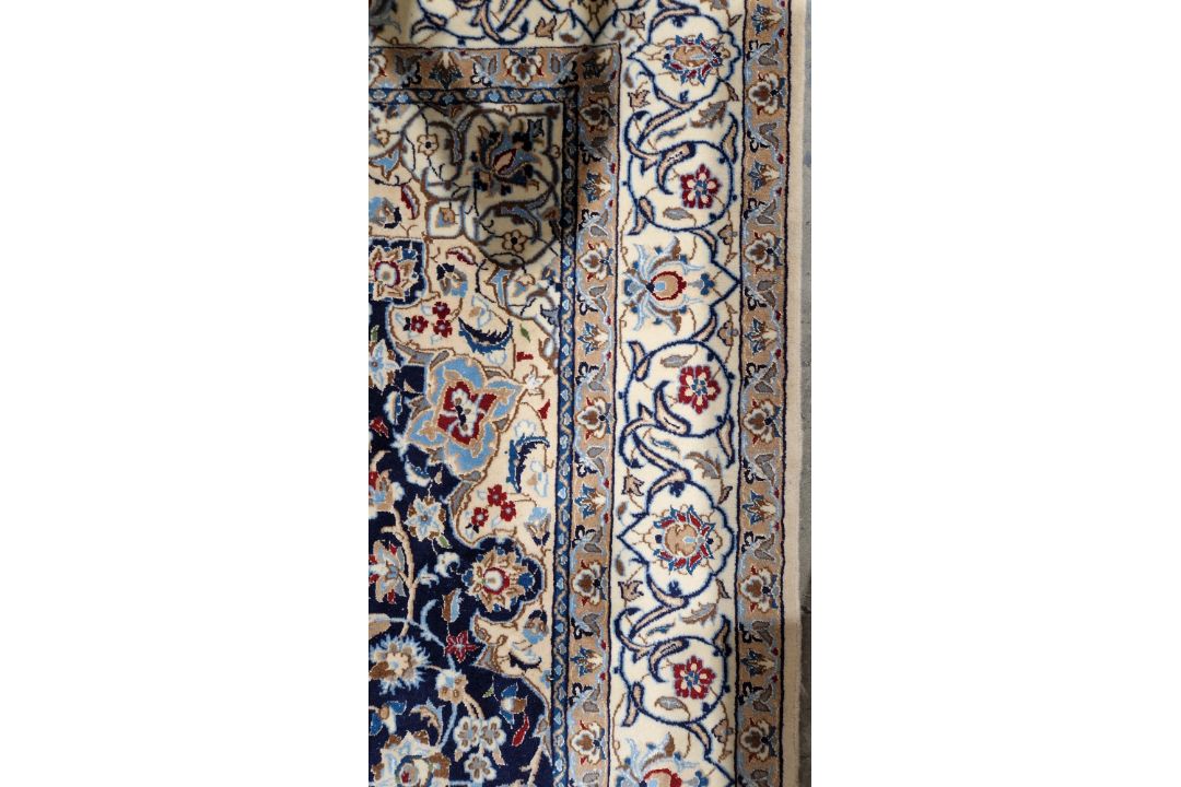 Large Persian midnight blue ground rug with central cream floral medallion on floral field, floral - Image 6 of 22