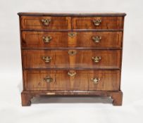 18th century walnut chest of two short over three long graduating drawers, the top with broad