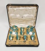 Cased Mappin and Webb set of Royal Doulton Art Deco speckled green and gilt ground demi-tasse and