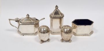 Silver three piece cruet set, Birmingham 1929, Adie Bros, each piece of elongated hexagonal form