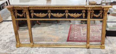 Regency style giltwood overmantel mirror, with acanthus leaf moulded cornice above a later black