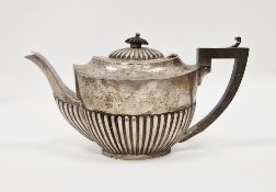 Edward VII silver teapot, Birmingham 1902 Henry Bourne, of oval half fluted form with ebony effect