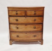 Early 19th century mahogany bowfronted chest of two short over three long graduating drawers, the
