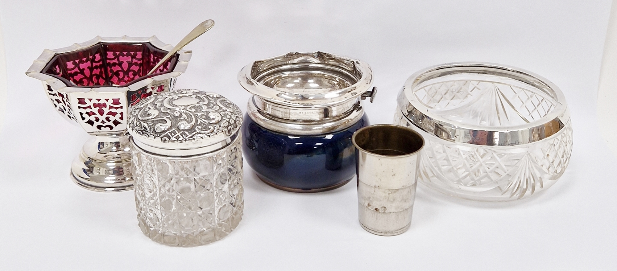 Silver-mounted Royal Doulton stoneware ashtray, circular, the silver mounts hinged to the mottled