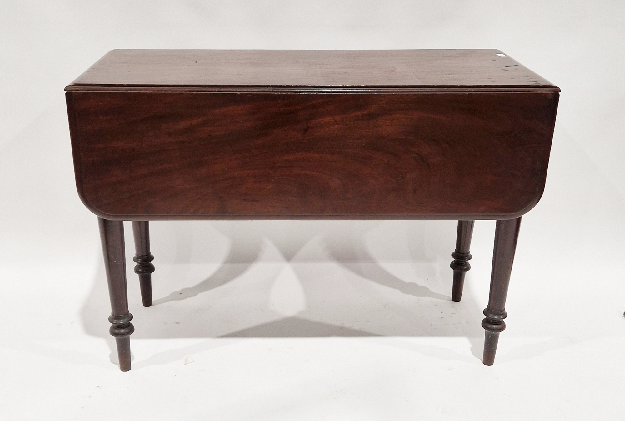19th century mahogany Pembroke table with drawer to one end and raised on turned tapering