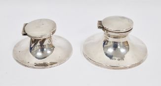Two silver capstan inkwells, one Chester 1924, S Blanckensee & Son Ltd, 9.5cm diameter and the other