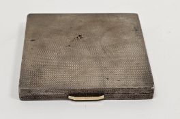 Silver compact, Birmingham 1947, maker F.G, of square form with engine turned decoration, gold-