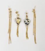 Pair of 9k yellow gold drop earrings, each comprising a mottle glass heart holding a chain link