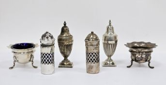 Pair of Victorian silver pepperettes, London 1886, Horace Woodward & Co, of urn form with fluted