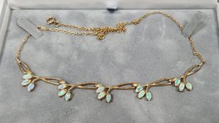 Modern 9ct gold and opal necklace having five sprays of triple opals, on integral fine chain