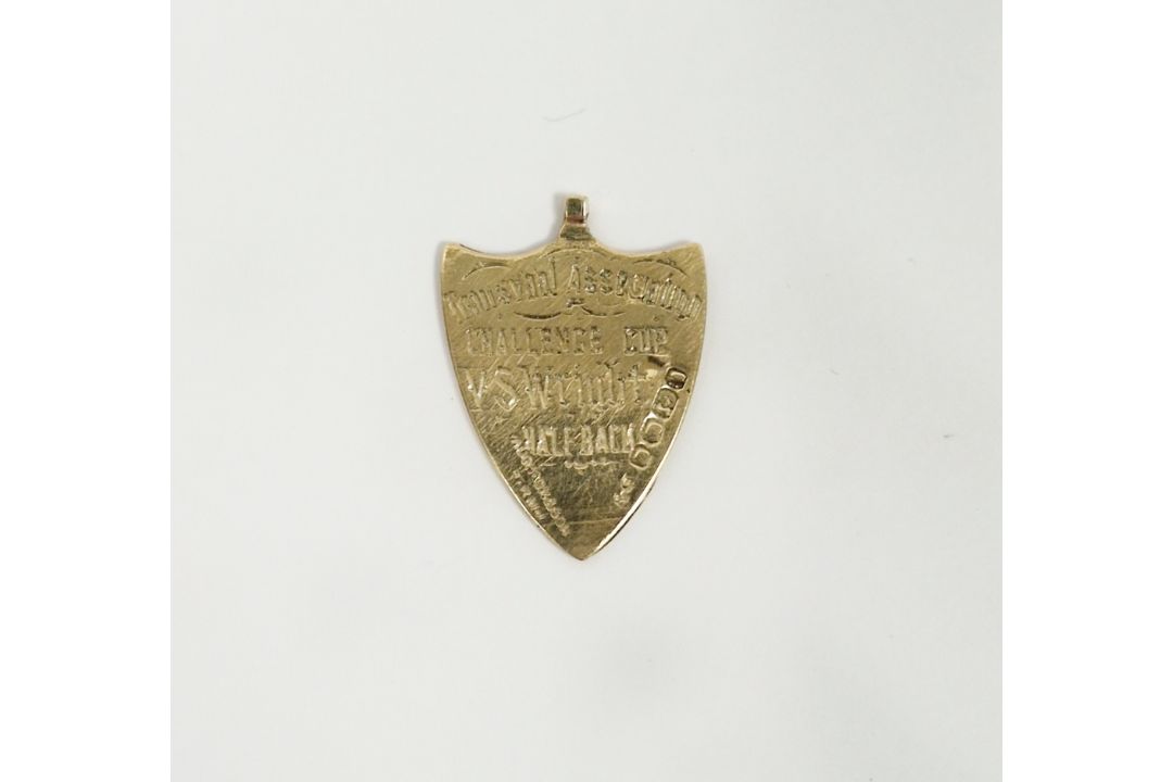 Victorian gold shield-shaped pendant, rubbed hallmarks, presented as an award for the Transvaal - Image 1 of 2